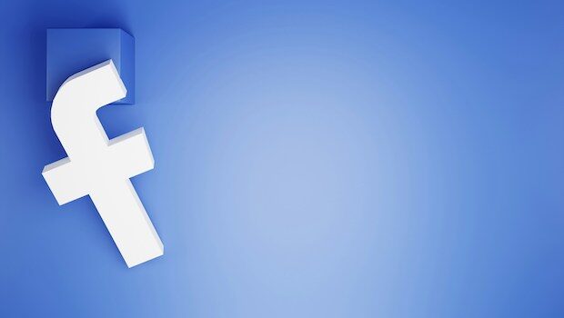 Facebook logo, slightly tilted, against a blue background